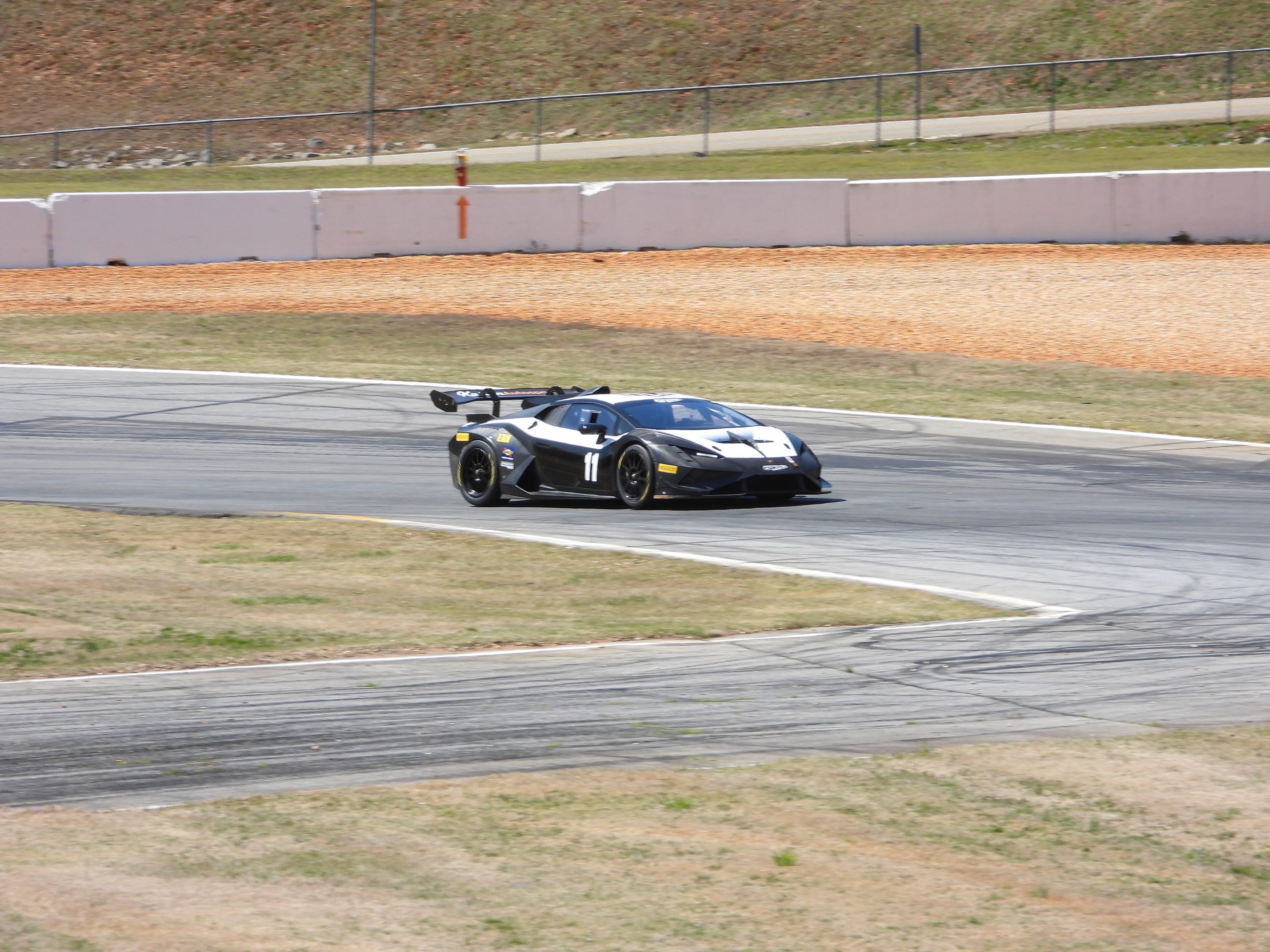 A Lamborghini GT car with an enormous spoiler