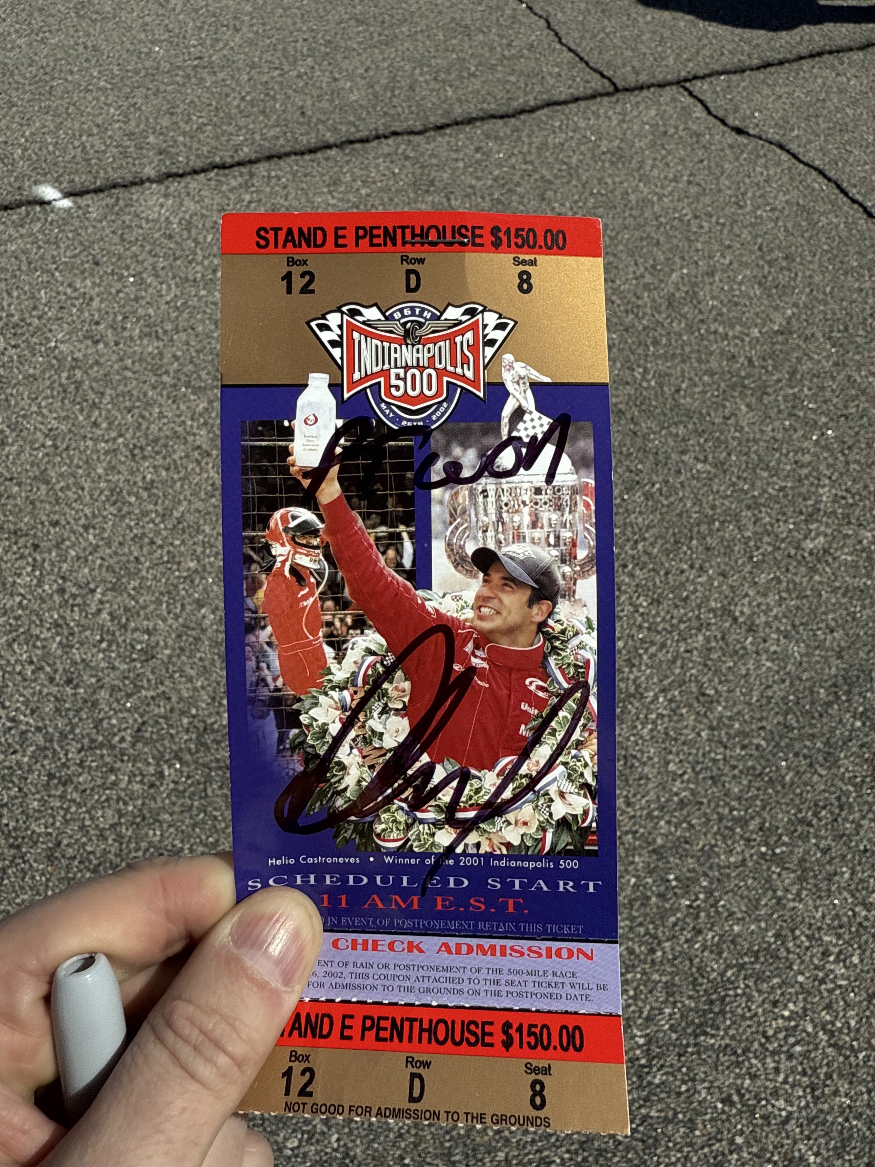 A 2002 Indy 500 ticket signed “PT won — Paul Tracy”