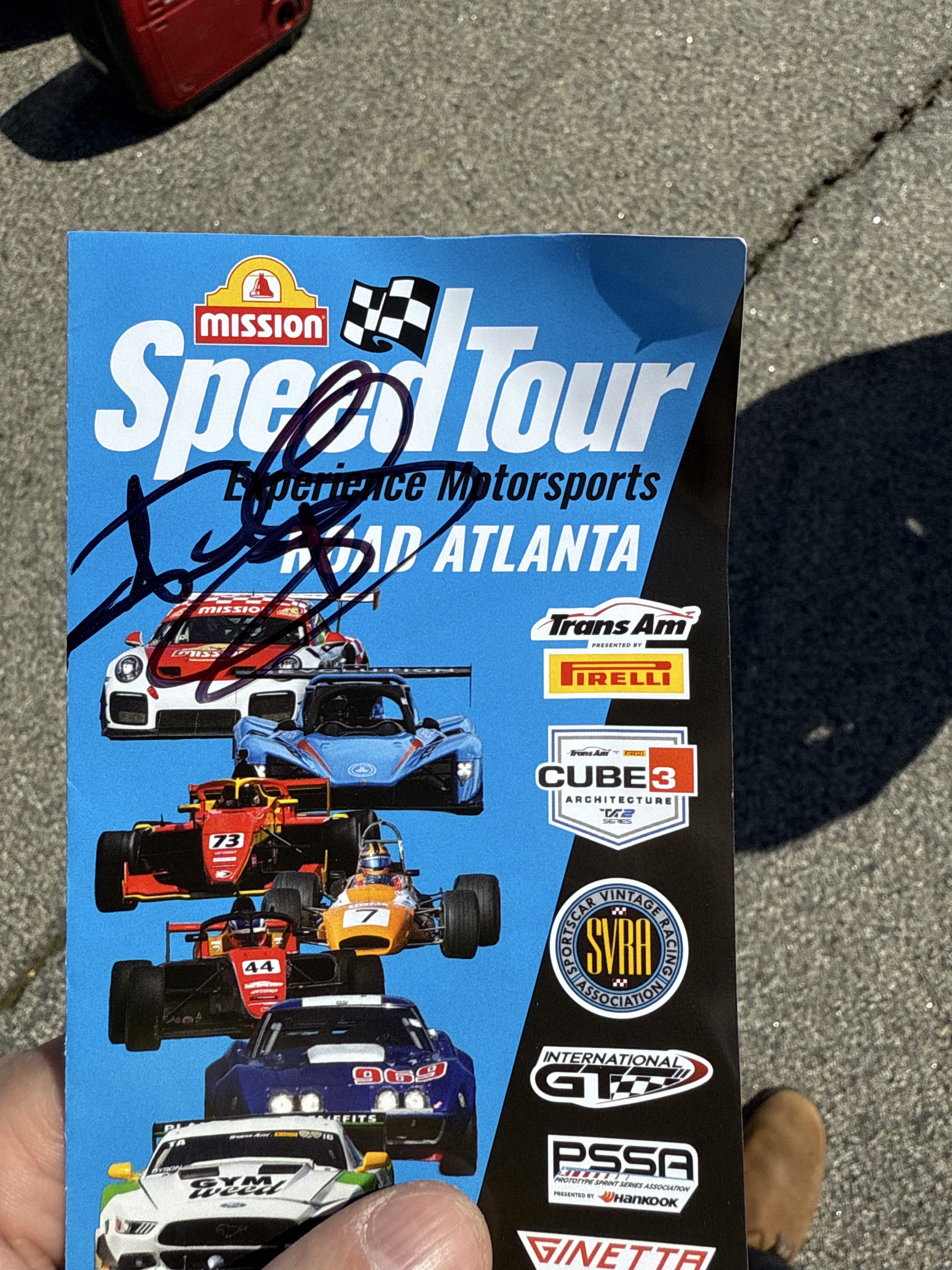 A 2025 SpeedTour at Road Atlanta brochure signed by Andy Lally