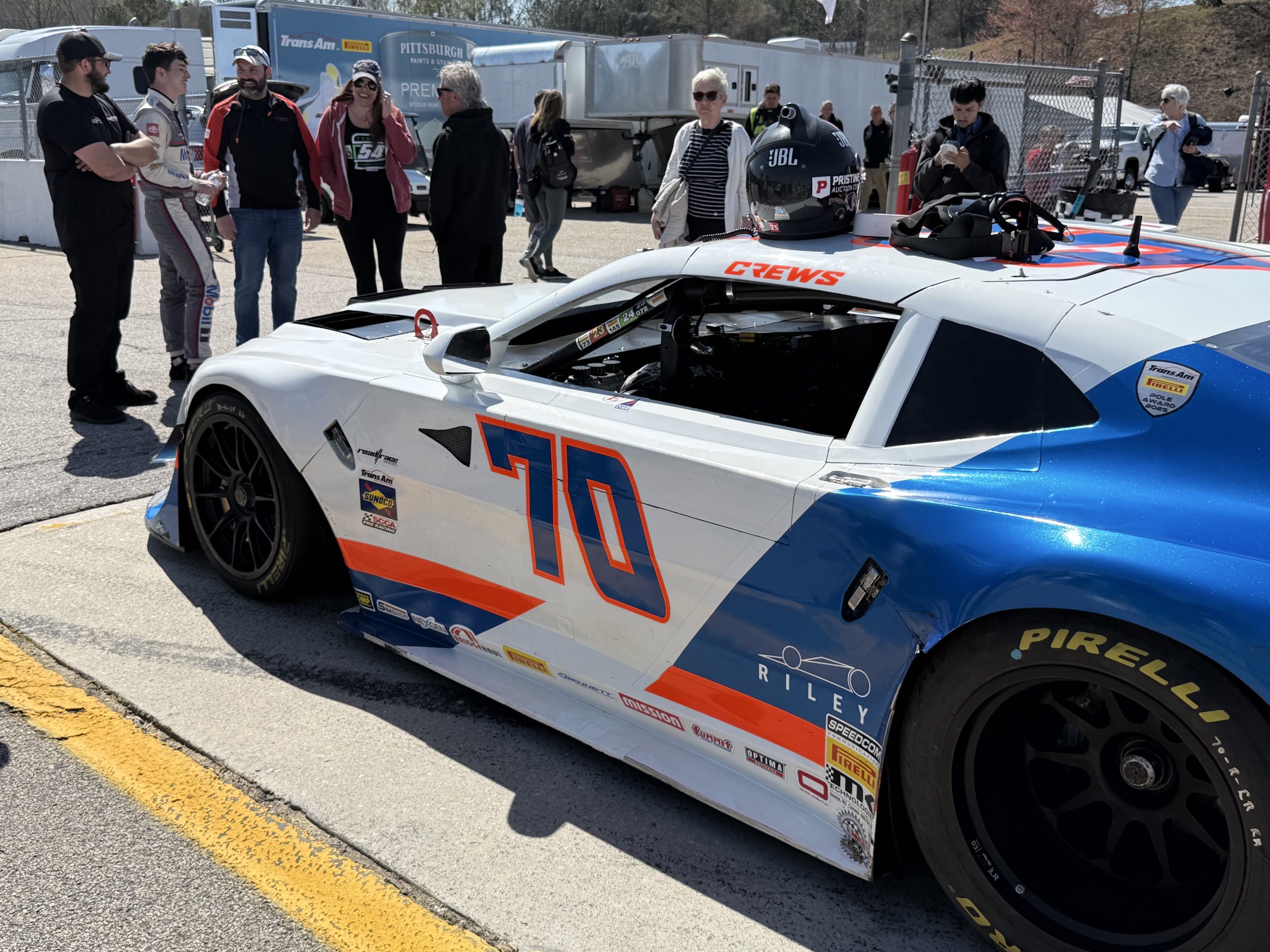 Brent Crews stands by his TA Camaro in pole position on the grid.