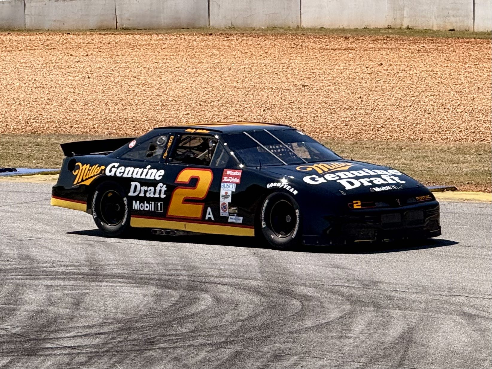 A #2 Pontiac NASCAR stock car in Miller Genuine Draft livery