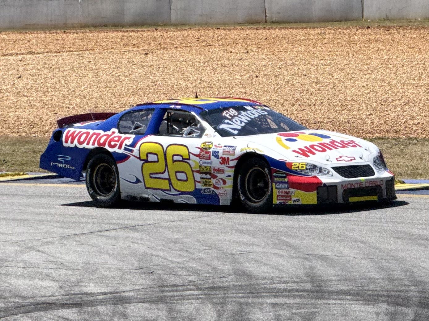 A #26 Chevrolet NASCAR stock car in Wonder Bread livery